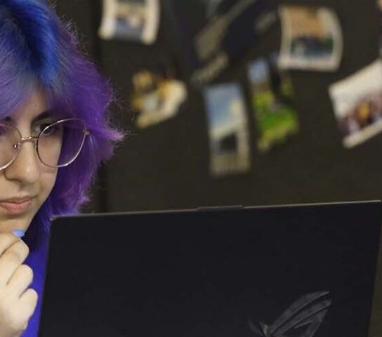 Photographic worker at a desk