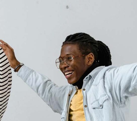 Staff in an office cheering
