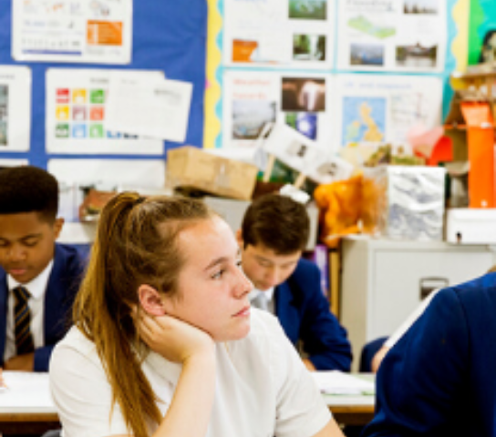 Students working at a desk.