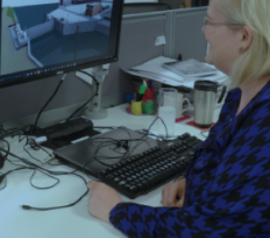A civil engineer working at her computer.