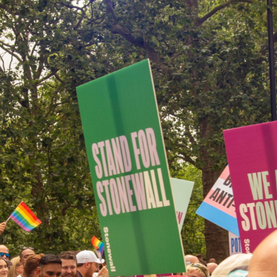 Website banner_people holding signs