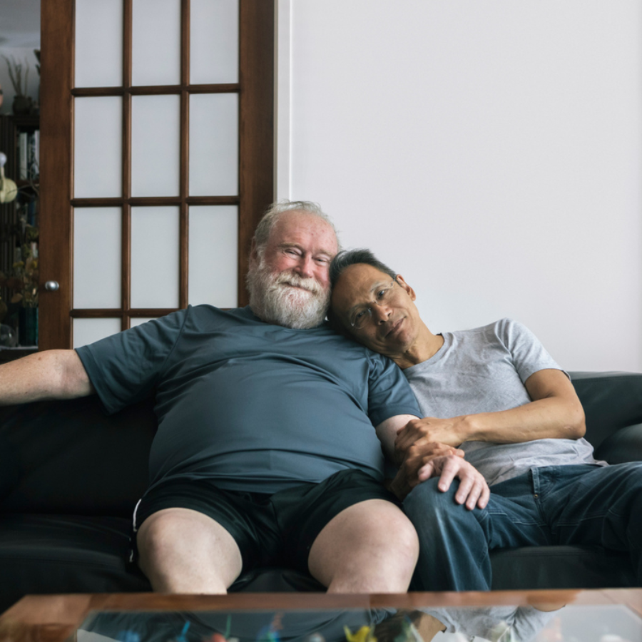 Two older people on a sofa