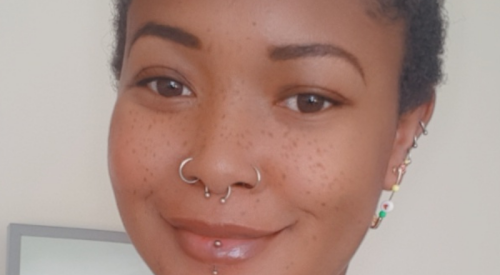 Person with nose rings looking at the camera